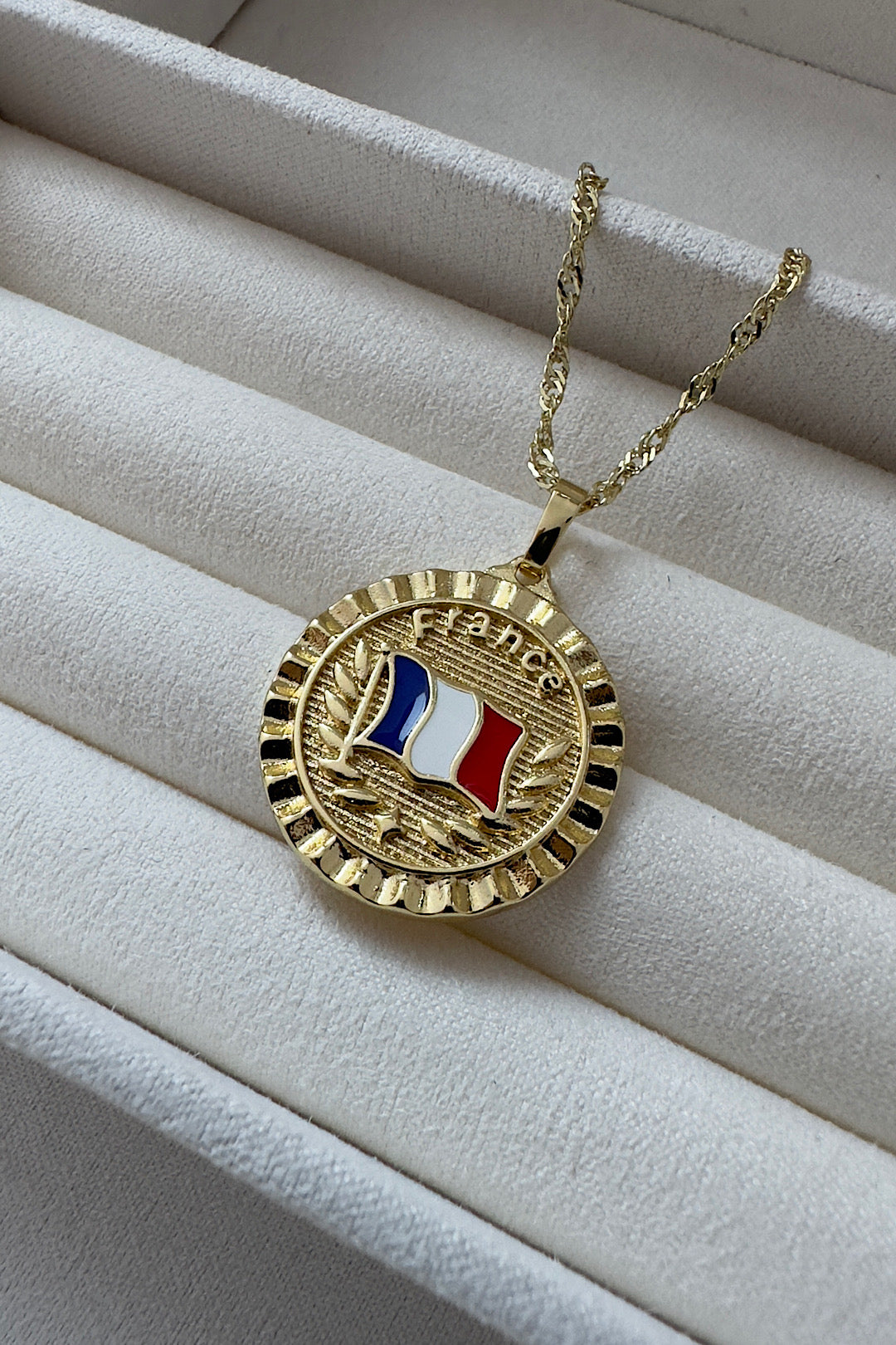 France Gold Swirl Necklace 
